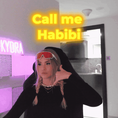 Woman In Black Shirt And Red Goggles Saying Call Me Habibi GIF