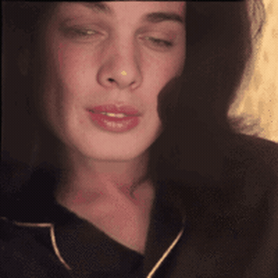 Woman In Black Shirt Close Up GIF