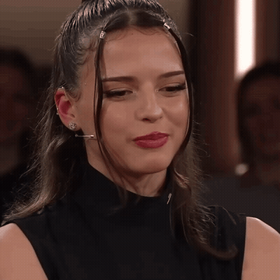Woman In Black Shirt Close Up GIF