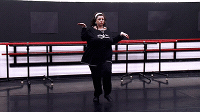Woman In Black Shirt Dancing Saying XSC GIF