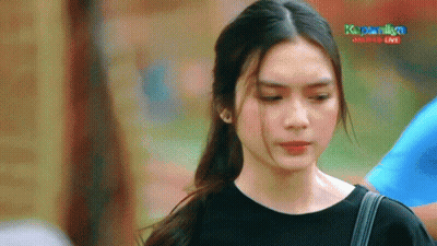 Woman In Black Shirt In Front Of Kapamilya Online Live Screen GIF