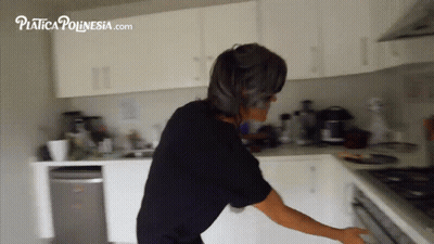 Woman in Black Shirt in Kitchen with platica ponesia.com