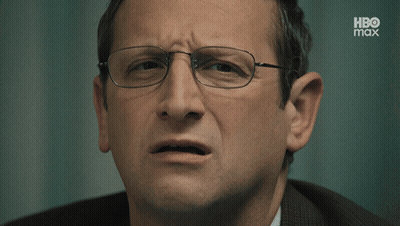 Woman In Black Shirt Making Face GIF