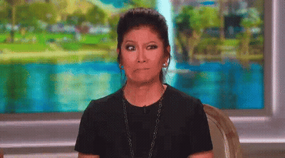 Woman In Black Shirt Making Funny Face GIF