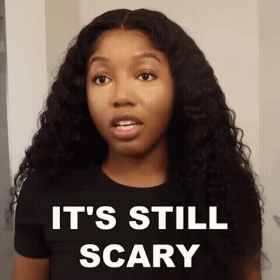 Woman In Black Shirt Saying It's Still Scary GIF