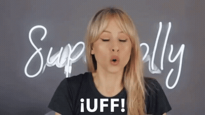 Woman In Black Shirt Saying Iuff With Superally Sign GIF