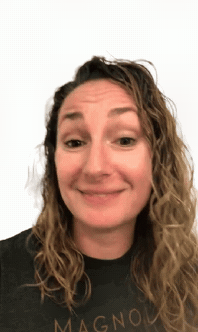 Woman In Black Shirt Saying Magnolia Smiles GIF