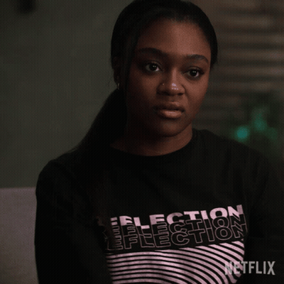 Woman In Black Shirt Saying Selection Reflection GIF