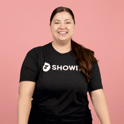 Woman In Black Shirt Saying Showi Smiling GIF