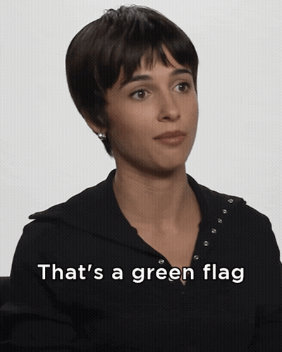 Woman In Black Shirt Saying That's A Green Flag GIF