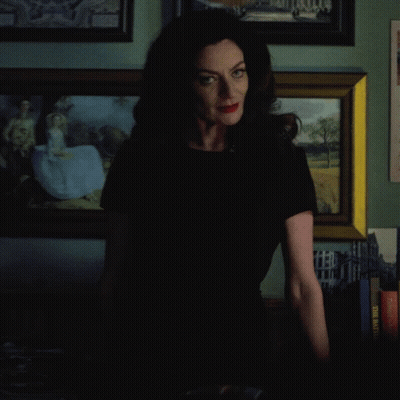 Woman In Black Shirt Saying Women Should Be In Charge Of Everything GIF