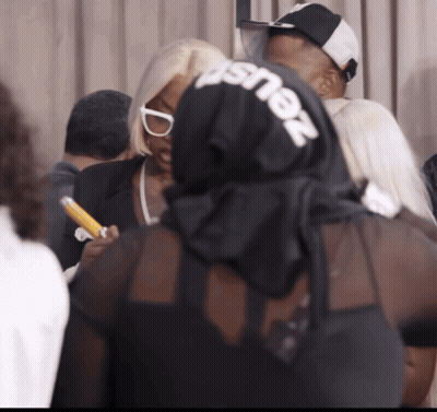 Woman In Black Shirt Saying Zeus GIF