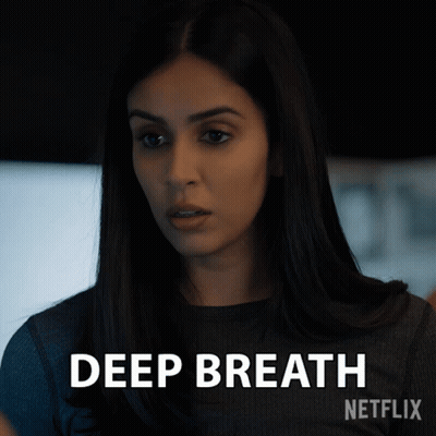 Woman In Black Shirt Says Deep Breath GIF
