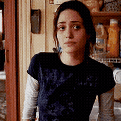 Woman In Black Shirt Standing In Kitchen GIF