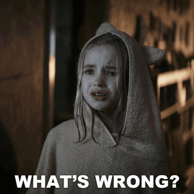 Woman In Black Shirt Sticking Tongue Out GIF