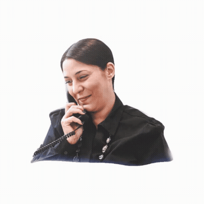Woman In Black Shirt Talking On Phone GIF