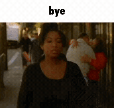 Woman In Black Shirt Walking Bye GIF