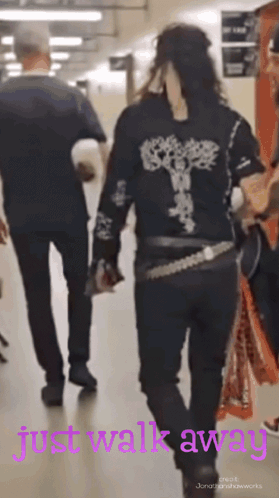 Woman In Black Shirt Walks Away GIF