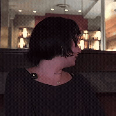 Woman In Black Shirt With I Love You Neck Tattoo GIF