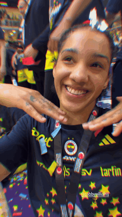 Woman In Black Shirt With Tart Lanyard GIF