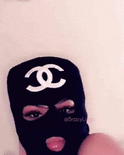 Woman In Black Ski Mask With Chanel Logo GIF