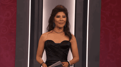 Woman In Black Strapless Dress Holding Microphone GIF