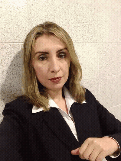 Woman In Black Suit Giving Thumbs Up GIF