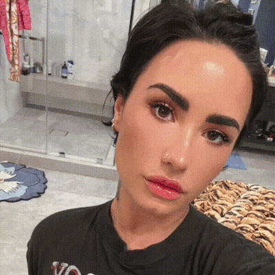 Woman In Black T-Shirt Saying Via GIF