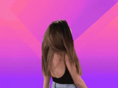 Woman In Black Tank Top Dancing In Front Of Wonderful Sign GIF