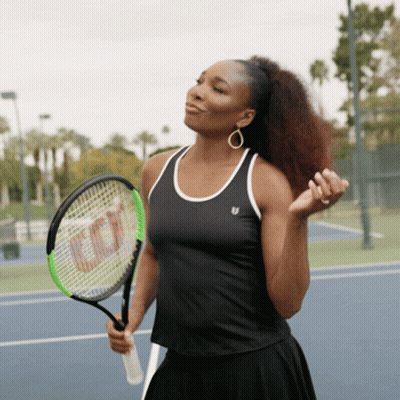 Woman In Black Tank Top Holding Wilson Tennis Racquet GIF