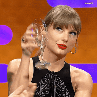 Woman In Black Tank Top Holding Wine GIF