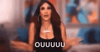 Woman In Black Tank Top Making Funny Face Saying Ouuuu GIF