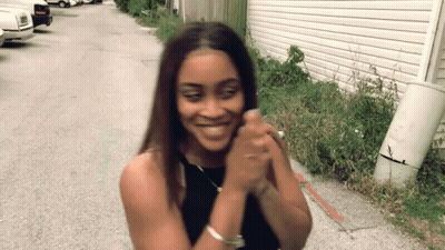 Woman In Black Tank Top Smiling GIF