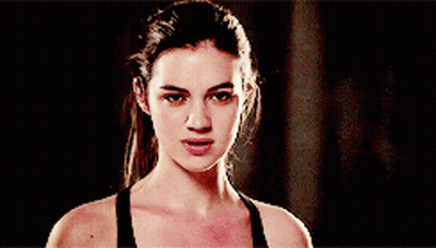 Woman In Black Tank Top Smiling Funny Face GIF