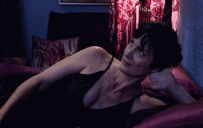 Woman In Black Tank Top Stretching GIF