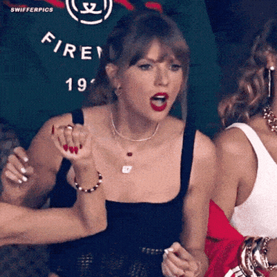 Woman In Black Tank Top With Green Shirt Saying Fire 19 GIF