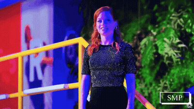 Woman In Black Top And Black Skirt By Railing GIF