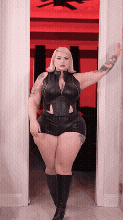 Woman In Black Top And Shorts In Doorway GIF