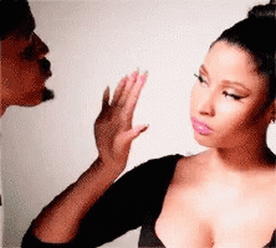 Woman In Black Top High-Fiving Man GIF