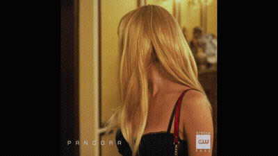 Woman in Black Top Pandora Ad