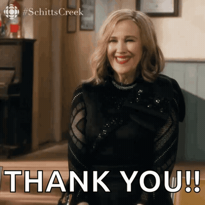 Woman In Black Top Smiling Thank You GIF