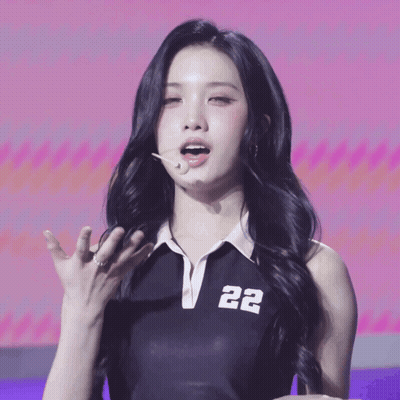 Woman In Black Top With Number 22 GIF