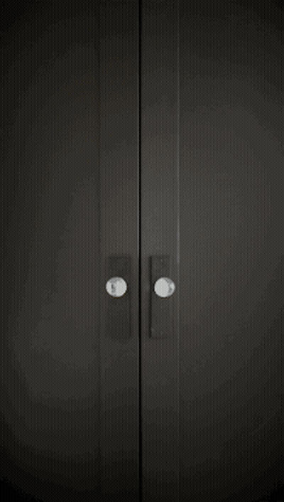 Woman In Black Turtleneck And Gold Hoop Earrings GIF
