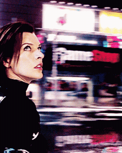 Woman In Black Turtleneck Looking Up GIF