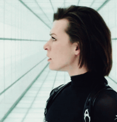 Woman In Black Turtleneck Looking Up GIF