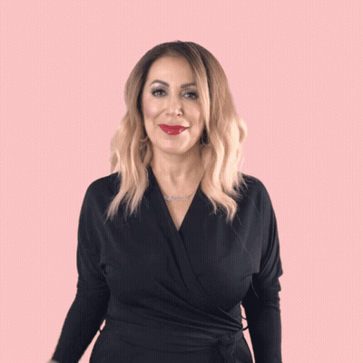 Woman In Black Wrap Top Giving High Five GIF
