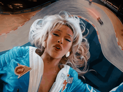 Woman In Blue And White Jacket With Letter M GIF