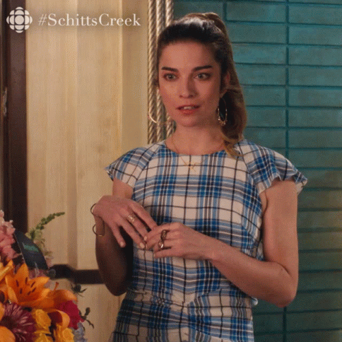 Woman In Blue And White Plaid Top Schitts Creek GIF