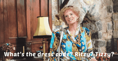 Woman in Blue and Yellow Dress Saying What's the Dress Code Ritzy Tizzy
