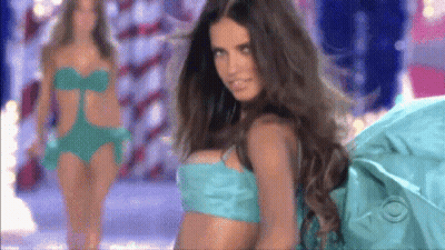 Woman In Blue Bikini On Runway CBS Logo GIF